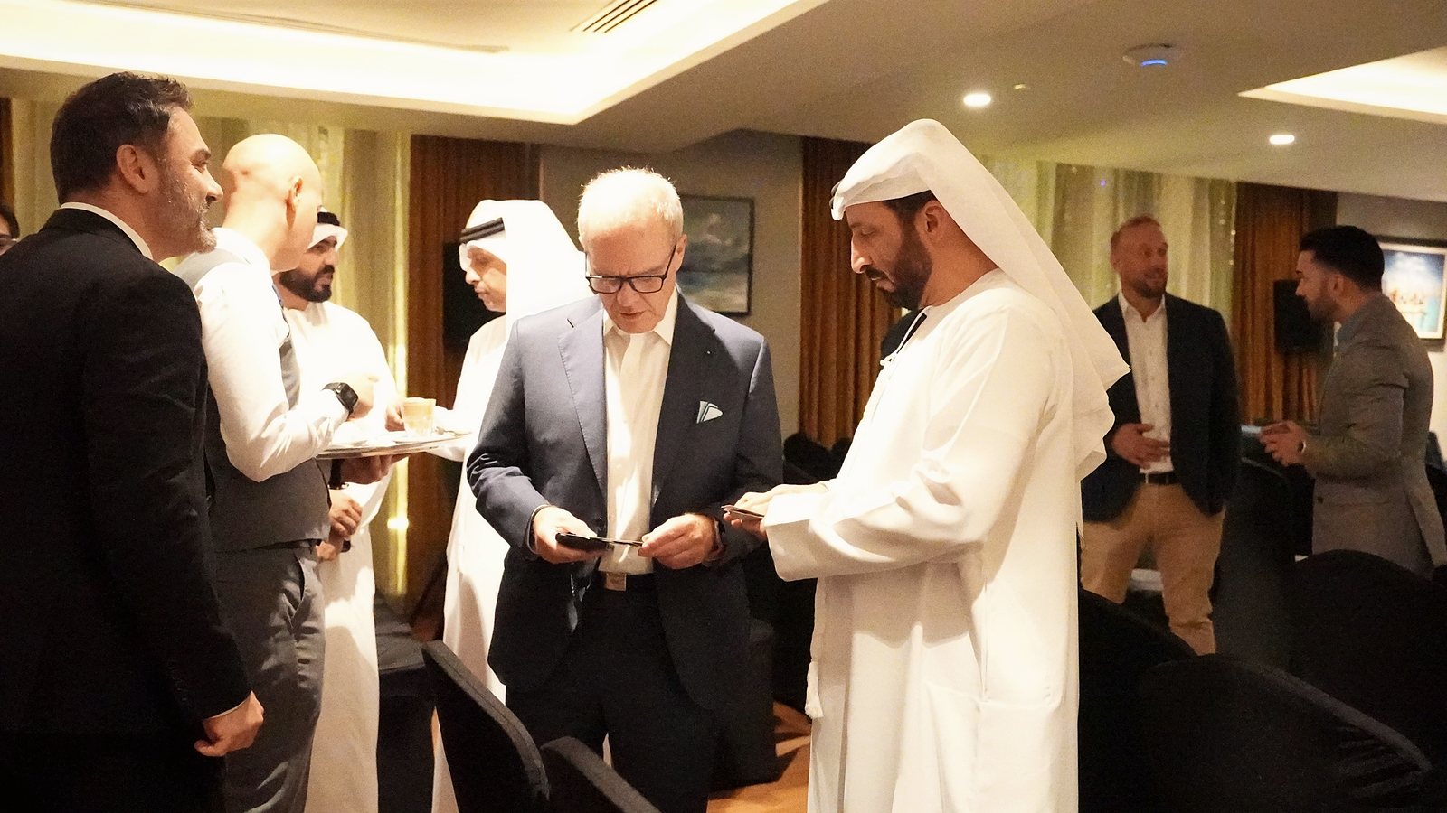 Principals in conversation at the closing reception of the September 2026 delegation